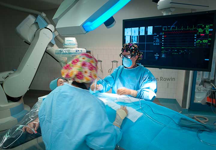 Photo of surgery in process in a Modern high tech operating room of hospital