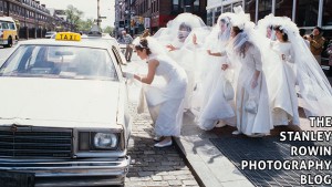 Running of the Brides, hail a taxi in Harvard Square
